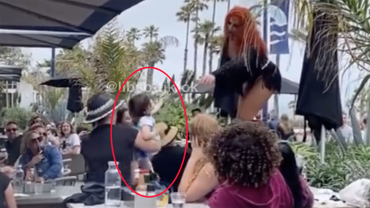 Watch: Alleged adult helps toddler tip drag queen during anotherΒ "family-friendly" sexualized performance