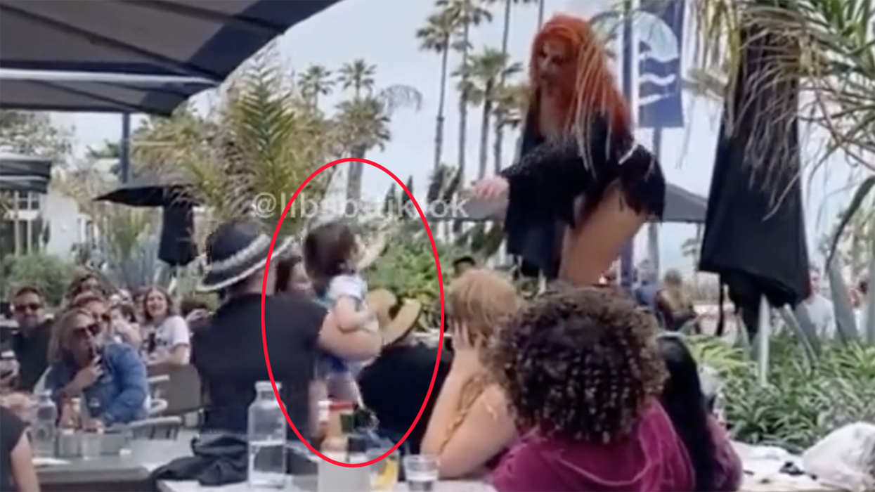 Watch: Alleged adult helps toddler tip drag queen during another  "family-friendly" sexualized performance