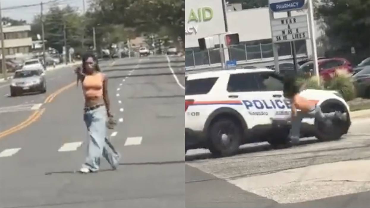 Watch: Police creatively take out woman firing gun in a busy intersection by sideswiping her with an SUV