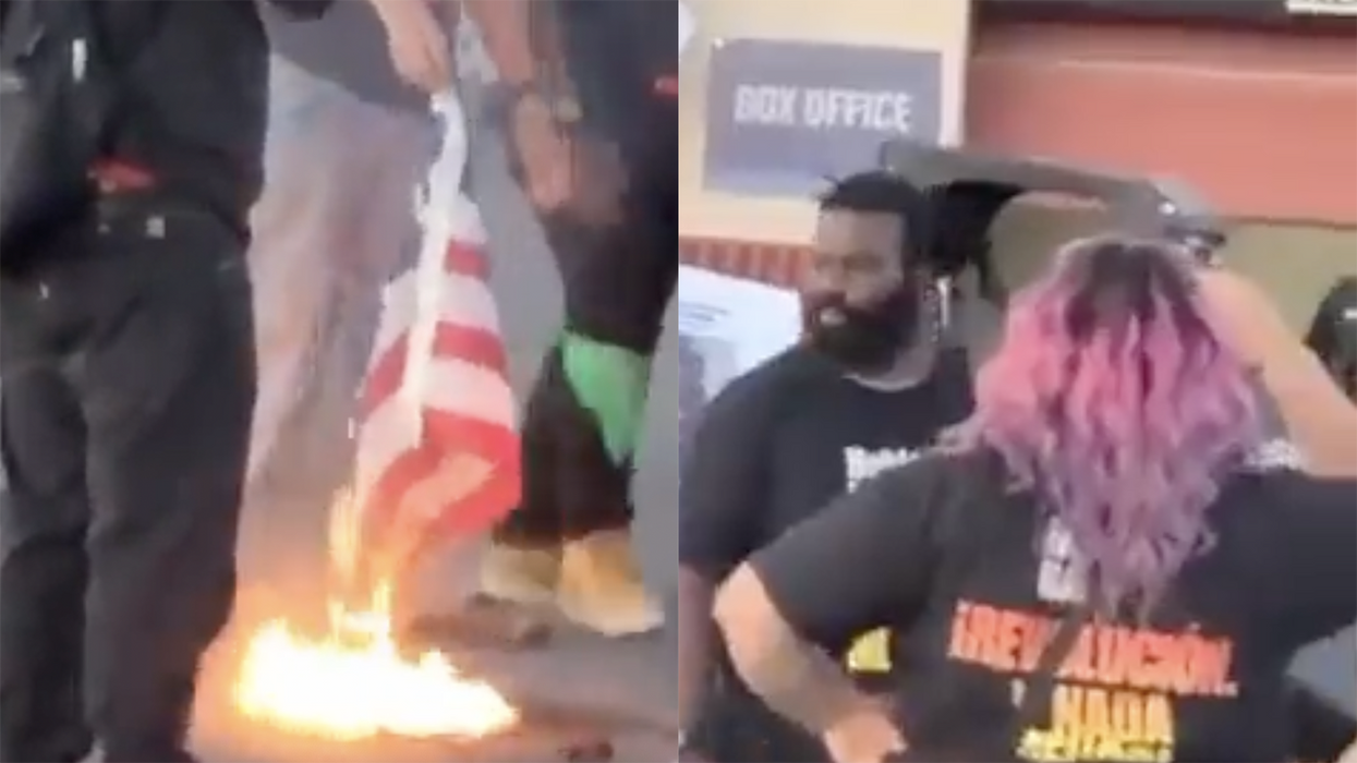 Watch: Chicago protesters burn an American Flag outside of a country music concert to claim they did it in a small town