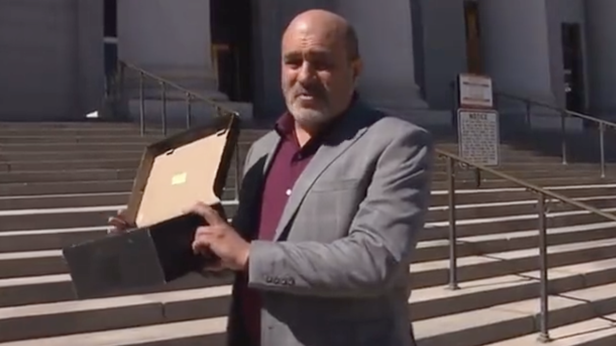 "This Is A Present From The Homeless": Watch This Fed Up CEO Dump Human Feces Outside City Hall