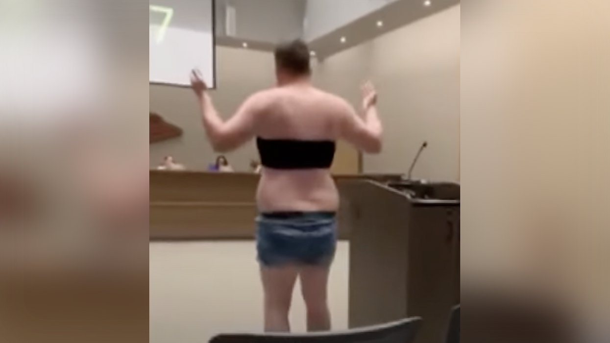 Watch: Daisy Dukes Dad Strips Down To Crop Top And Shorts At Board Meeting To Protest Absurdity Of School's Dress Code