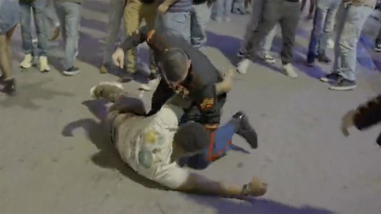 Watch: Dude swings on a group of Marines outside a nightclub; gets hit with fists, pavement, and instant regret