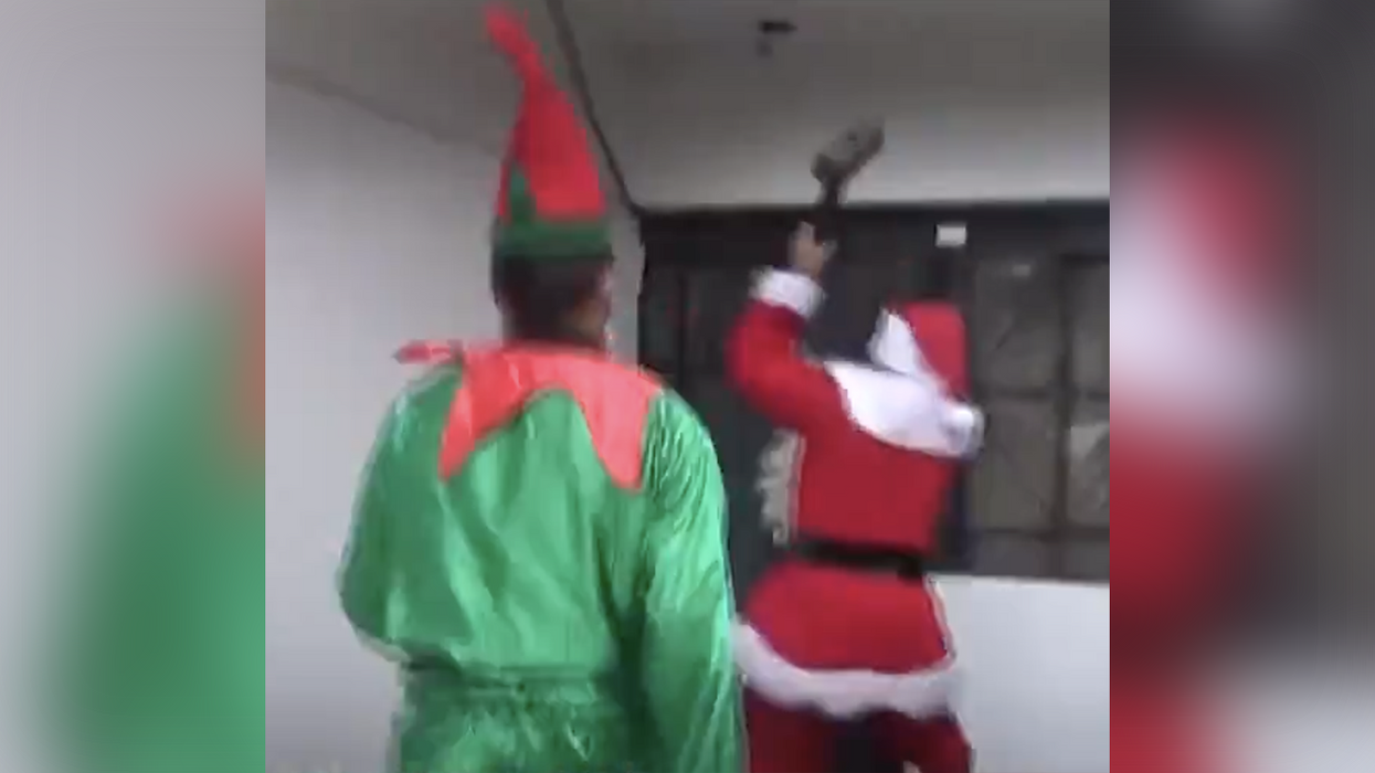 Watch: Santa Claus grabs a sledge hammer, confronts drug dealer on naughty list while elf has his six