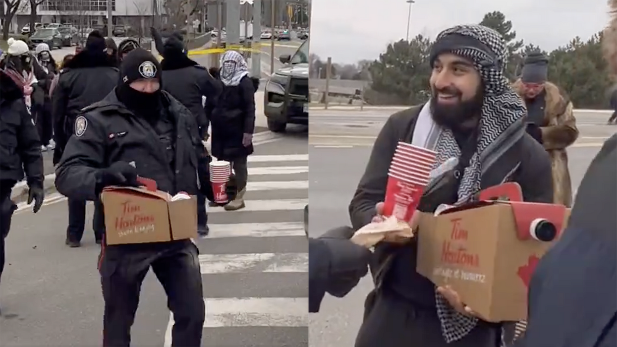 Watch: Instead of arresting pro-Hamas activists blocking traffic in Jewish neighborhood, police deliver them coffee