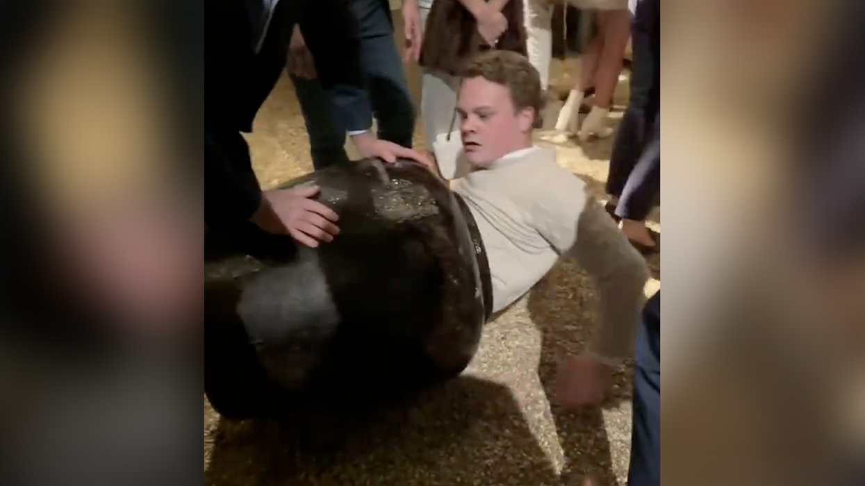 Watch: Are you even partying hard if you don't find yourself stuck in a giant decorative urn?