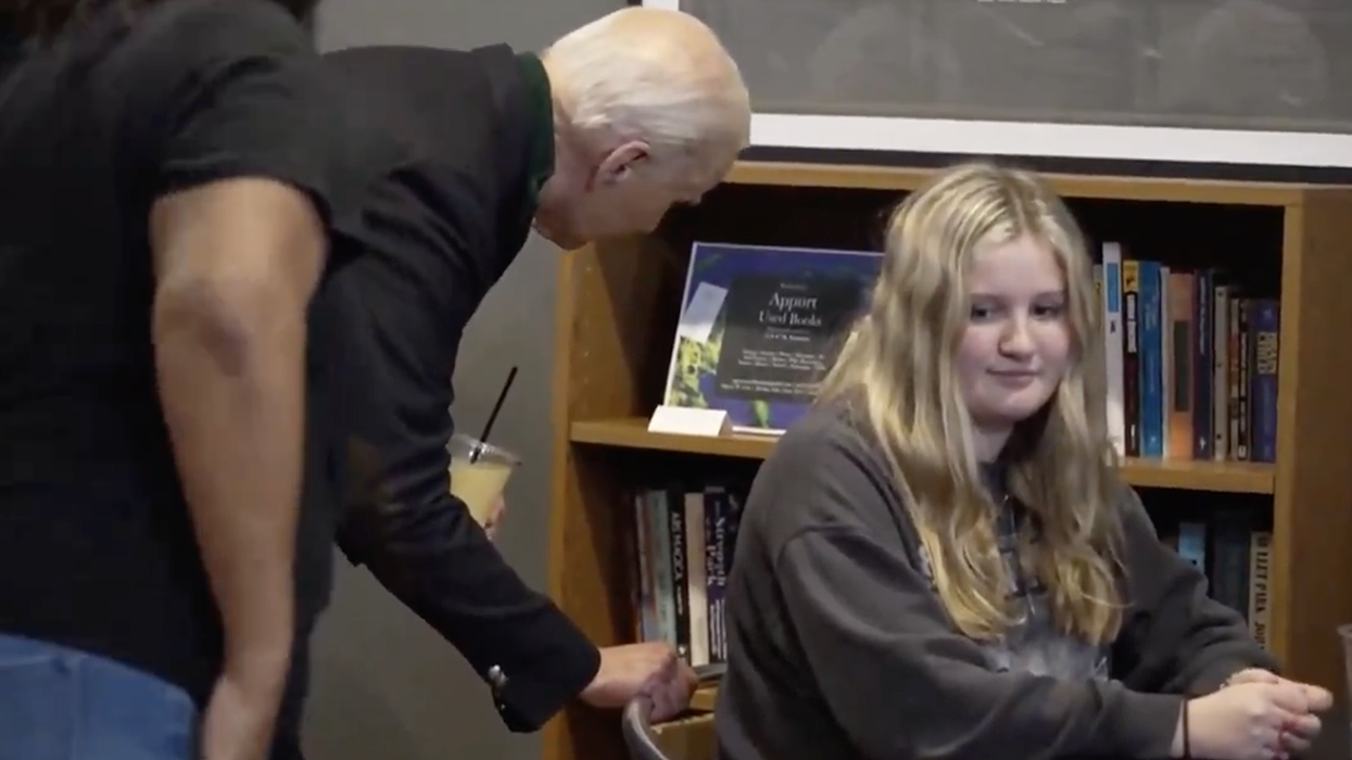 Watch: Joe Biden makes it weird creepin' on a young lady at a coffee shop as he's asked about embattled cabinet member