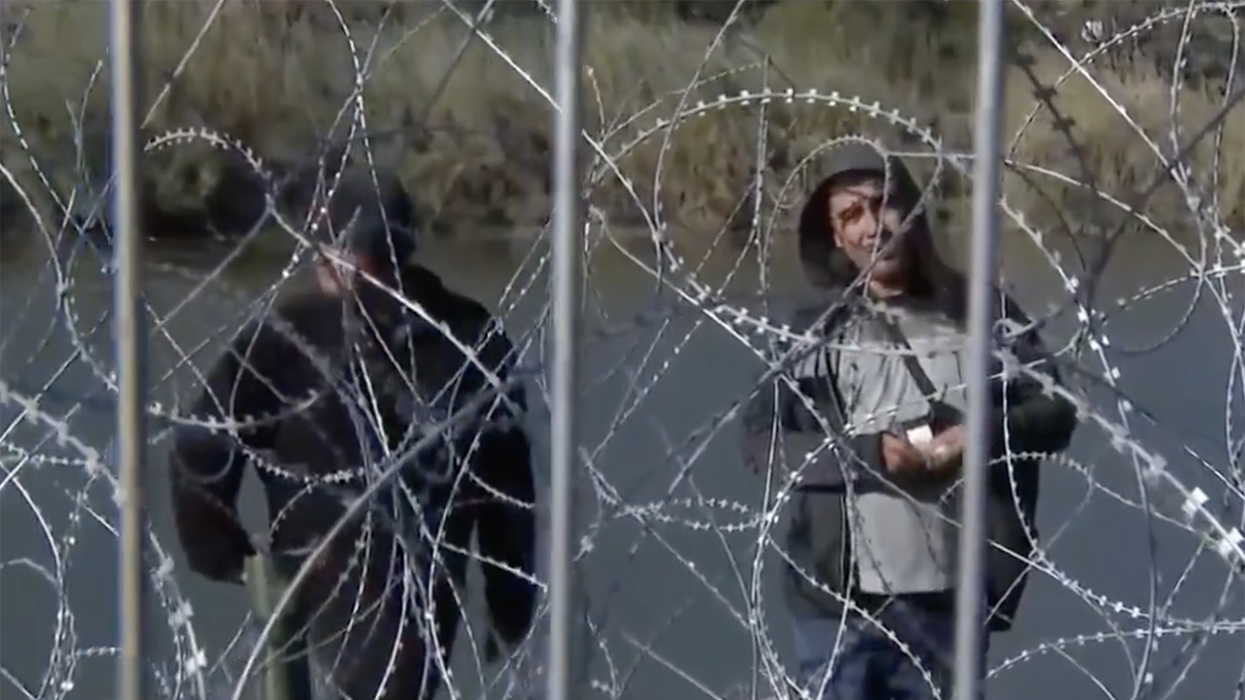 Watch: Illegals actively look for Biden's Border Patrol to let them in (since Texas won't and barbed wire is sharp)