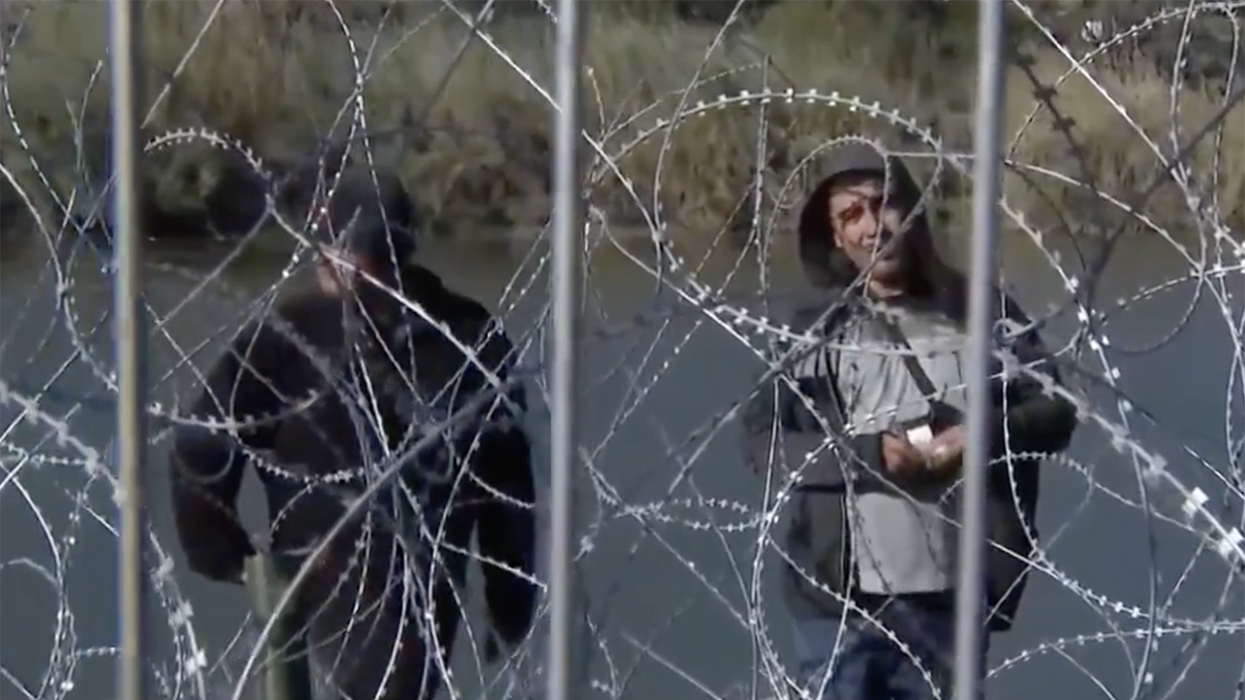 Watch: Illegals actively look for Biden's Border Patrol to let them in (since Texas won't and barbed wire is sharp)