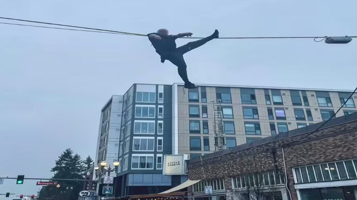 Watch: Man goes on crime spree, manages to get stuck in telephone wire running from the cops