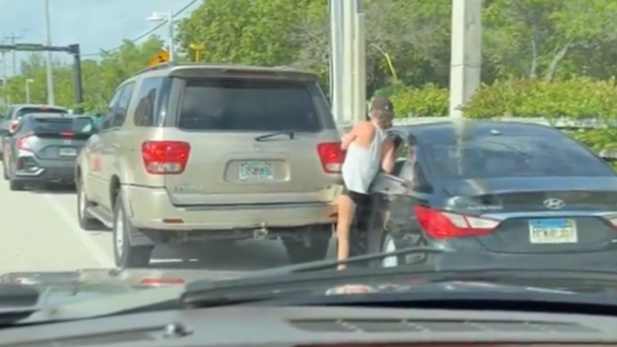 Watch: "Drunk Karen" gets out of her car and watches it roll away in hilarious road rage incident