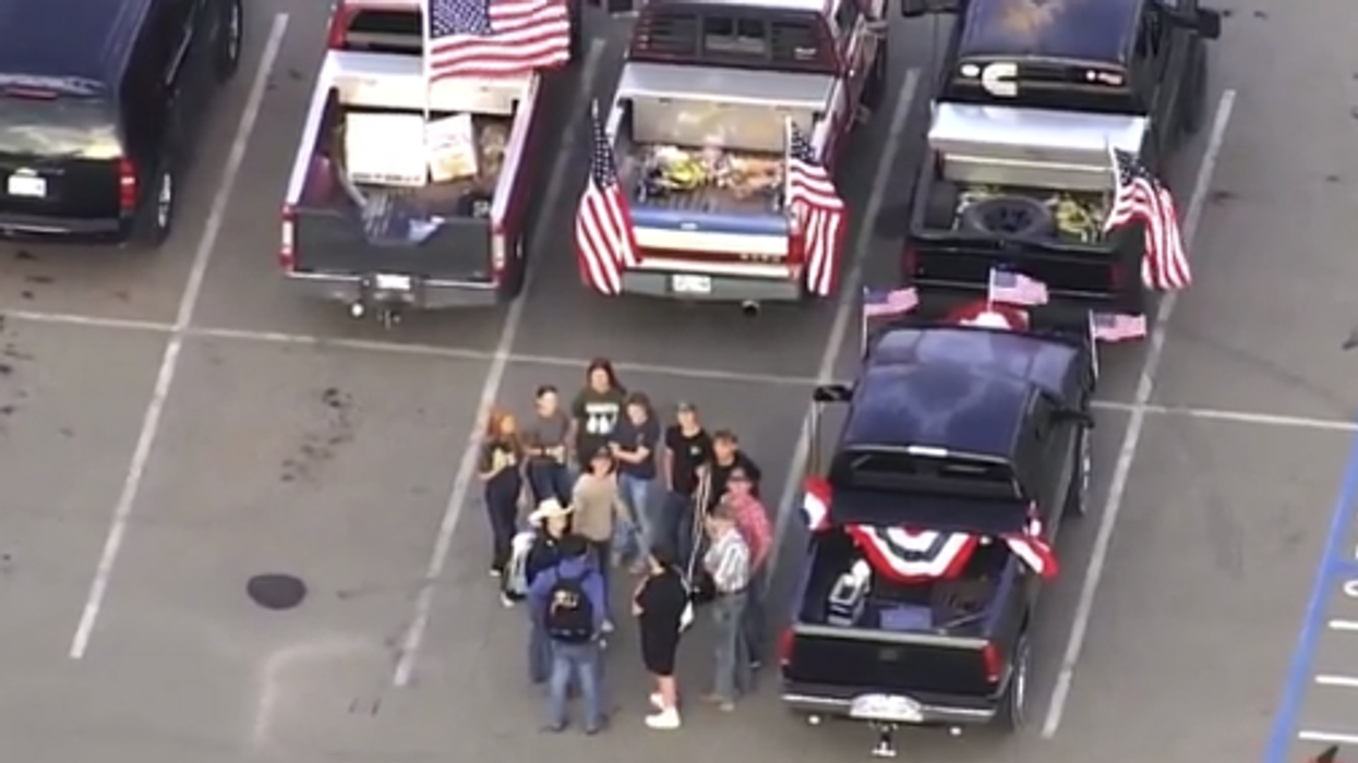 Remember that school district with the toe-licking videos? They just tried to ban the American Flag