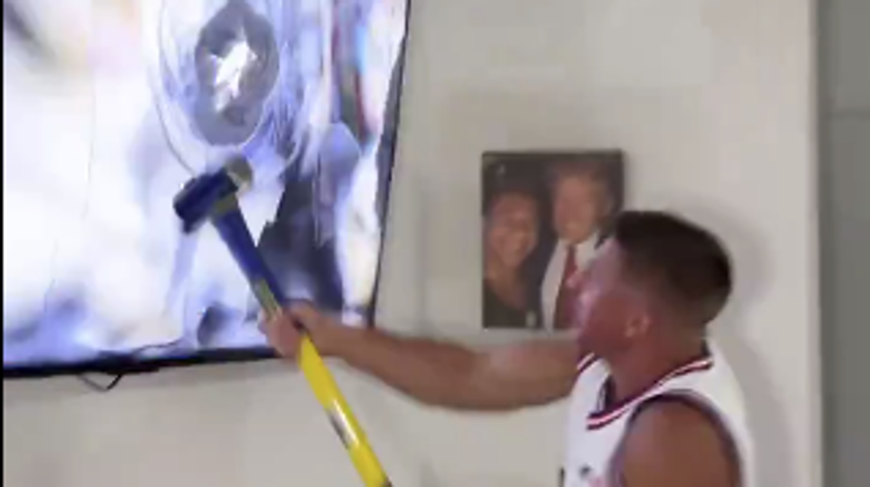 Watch: Influencer Destroys TV With Sledgehammer After Kamala Accepts DNC Nomination