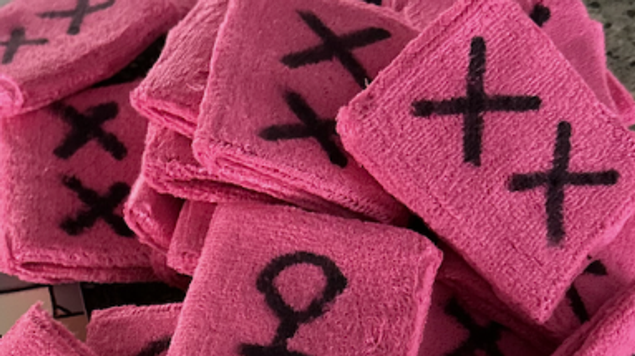 School BANS parents wearing pink armbands in silent protest about boys competing in girls' sports