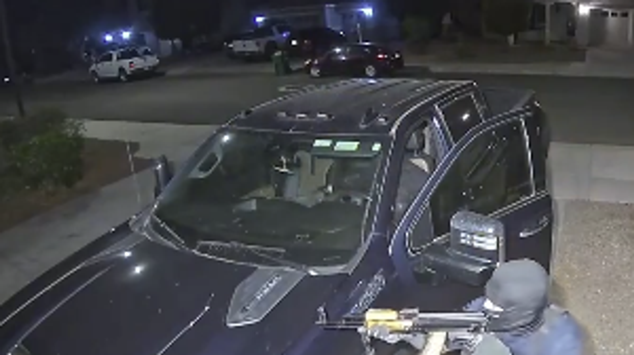 Watch: Couple wakes up to scary scene... goons stealing their truck with AK-47s