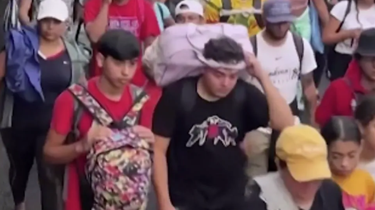 Watch: Massive Migrant Caravan Rushes To Southern Border To Secure Spot Before Trump Inauguration