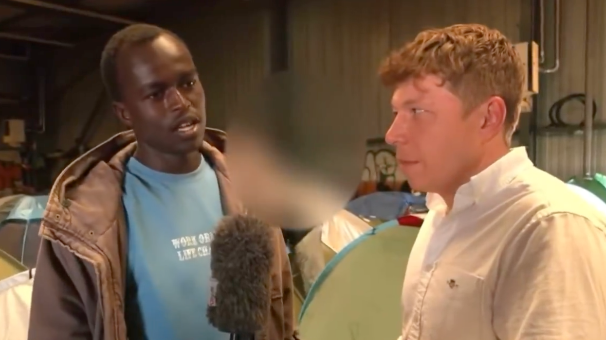 Migrant lectures reporter why legal citizens owe him a brand new house