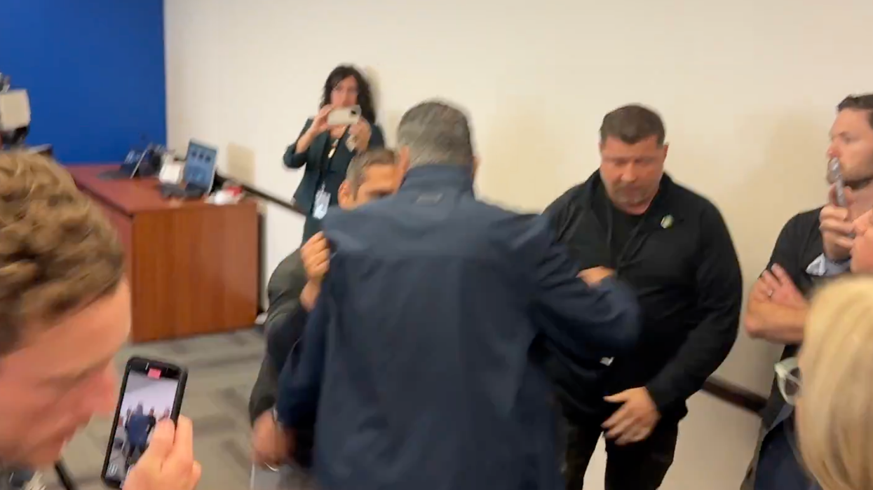 Democrat Senator attempts to aggressively confront a Trump cabinet secretary, gets dropped and put down by her security