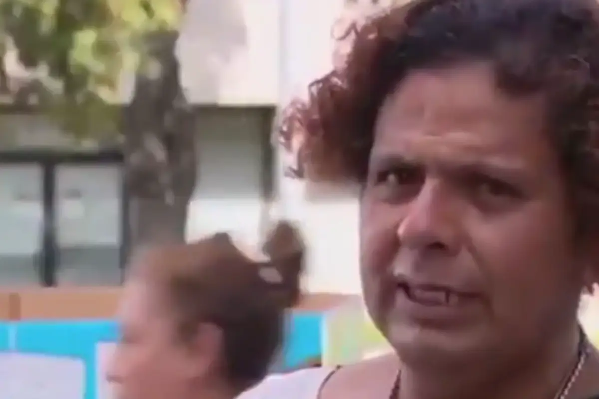 Trans Nicaraguan Refugee In Dress Is “Moved To Tears” Over Food Stamps Cut