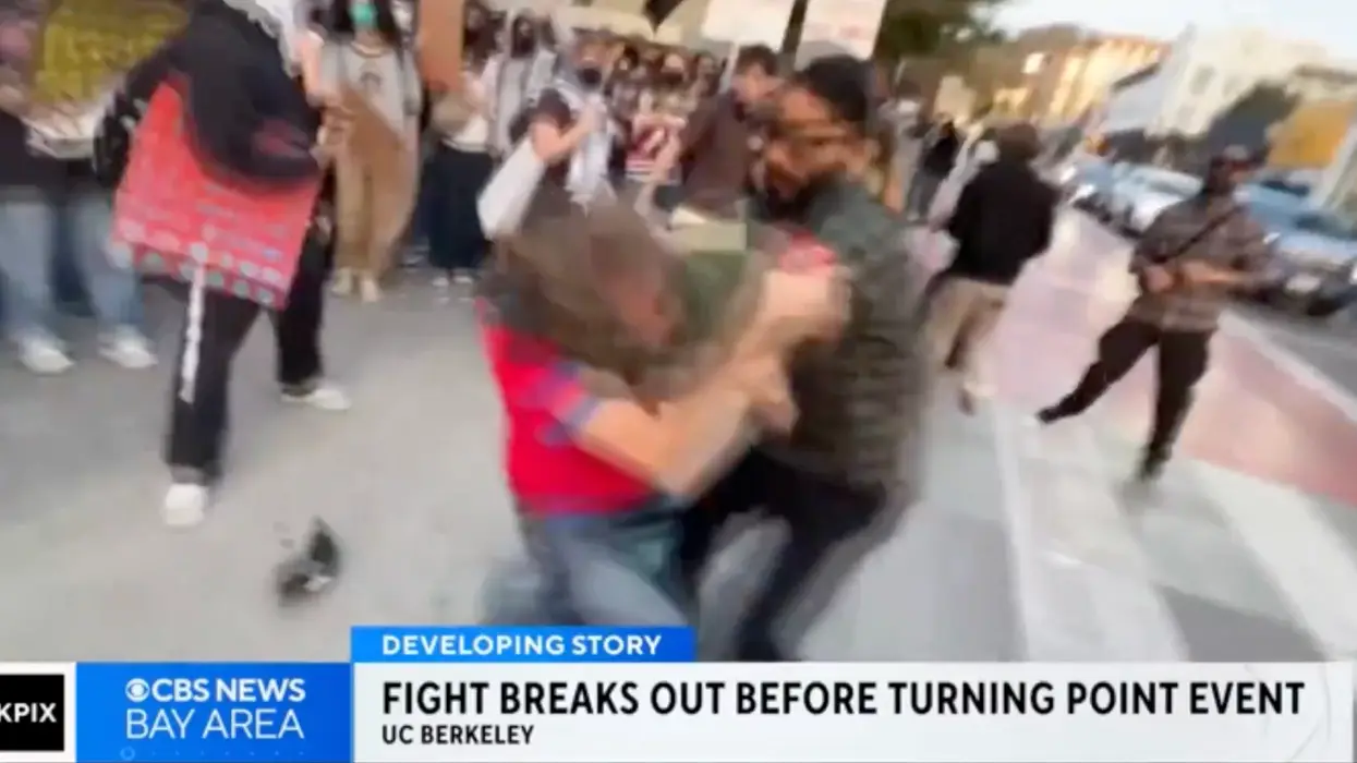 CBS Reporter Claims Turning Point Event Was “Mostly Peaceful," Before Showing Charlie Kirk Fan Savagely Attacked