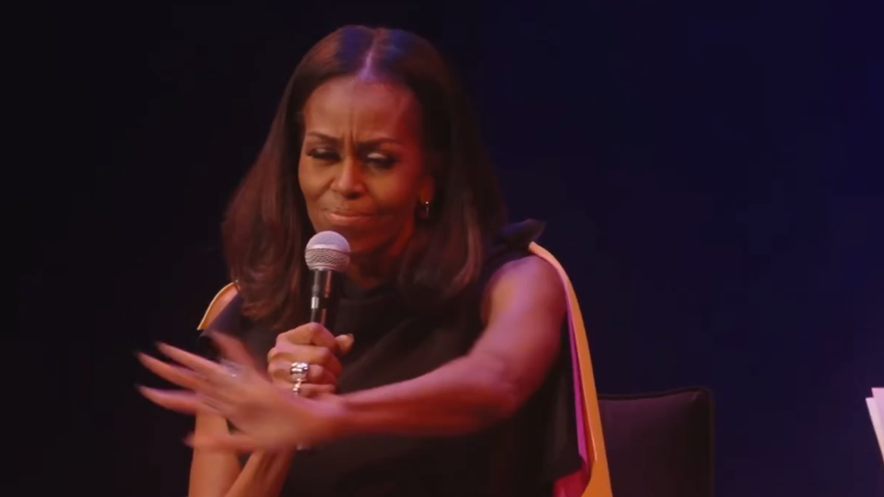 Michelle Obama blames white people for black people's hair. That's it. That's the headline.