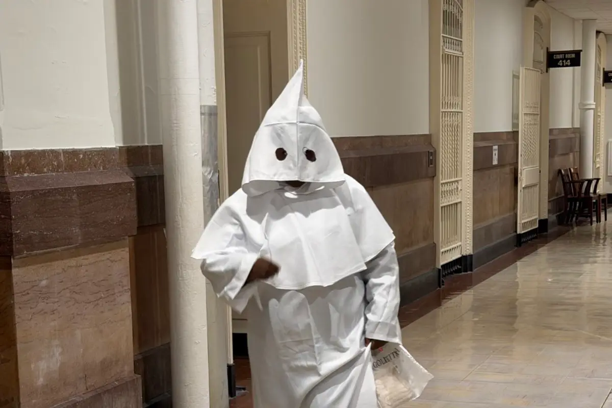 Woman shows up to court dressed in a KKK robe, but the shocking thing was finding out who was under the hood
