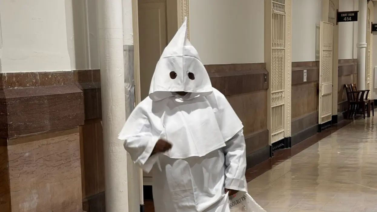 Woman shows up to court dressed in a KKK robe, but the shocking thing was finding out who was under the hood
