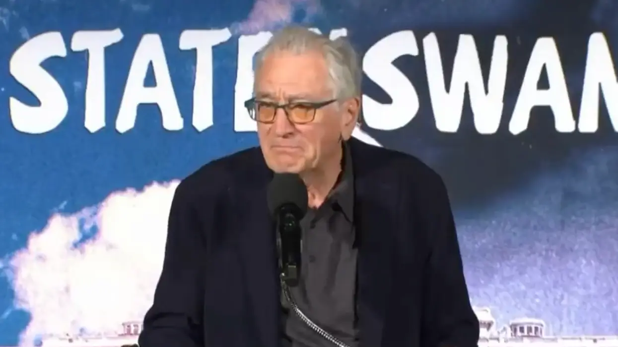 Robert De Niro claims loving America is like loving a spousal abuser. No, really. He said it with his whole chest and everything