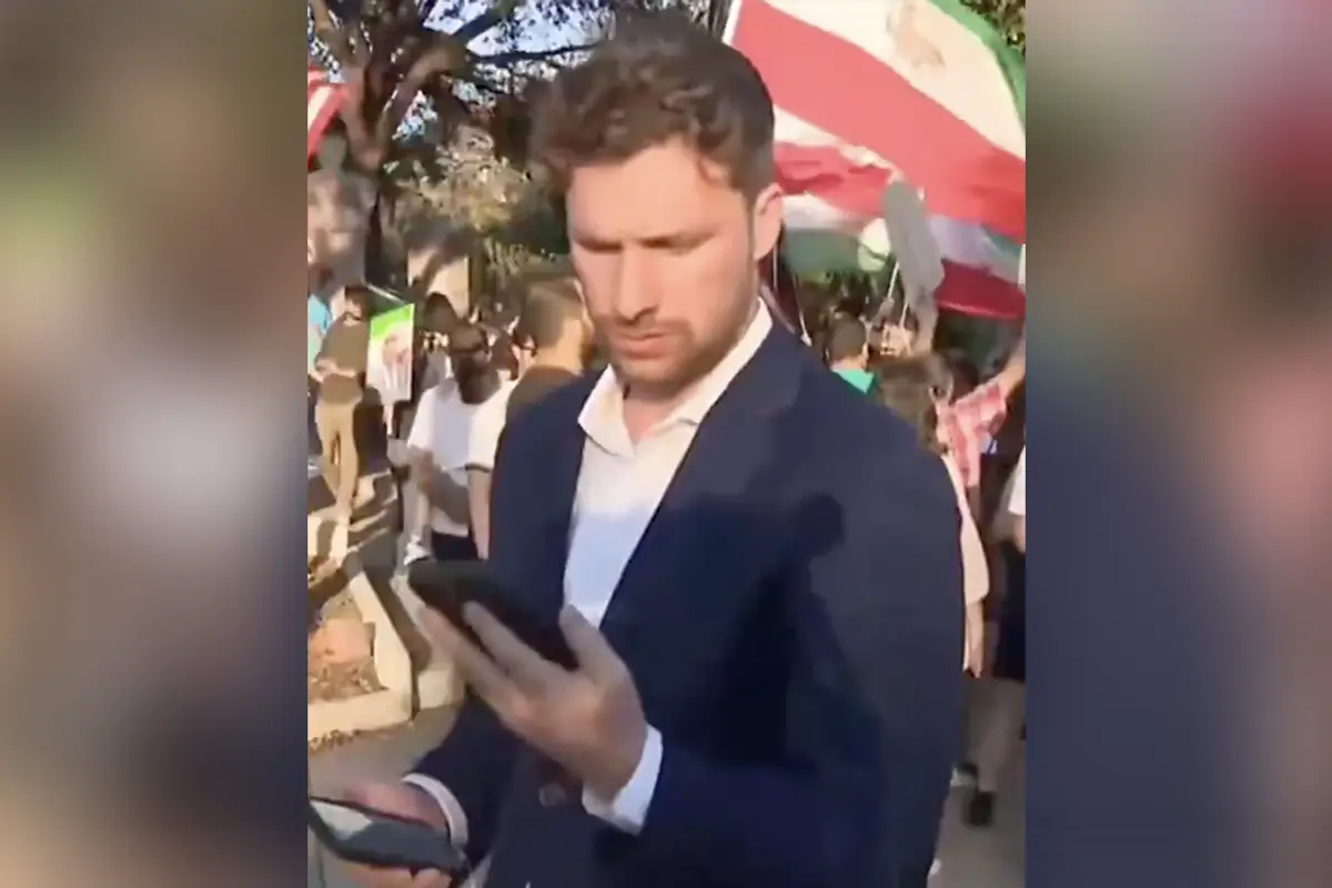 CBS reporter gets told not to focus on the rally supporting Trump's actions in Iran, but he goes viral doing it anyway