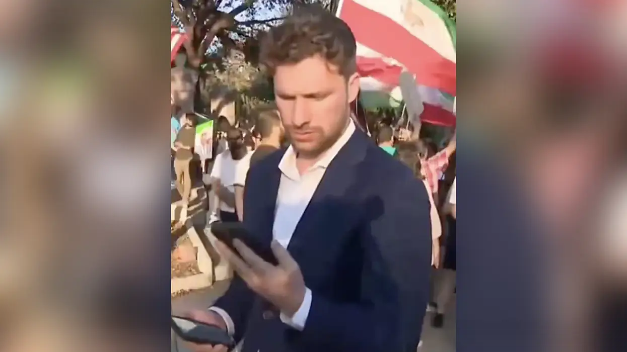 CBS reporter gets told not to focus on the rally supporting Trump's actions in Iran, but he goes viral doing it anyway