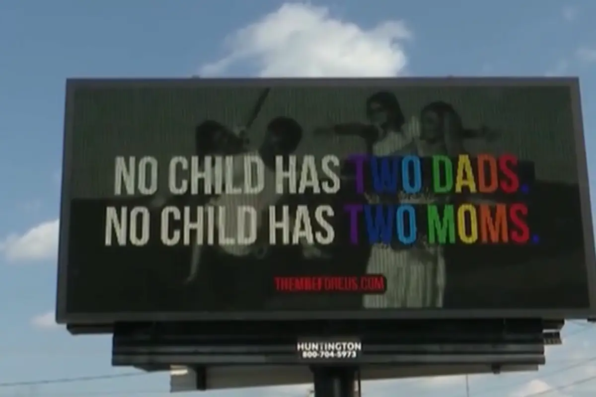 Someone put up a billboard that says no child has "two dads," and the LGBTQ+ community is beside themselves over it