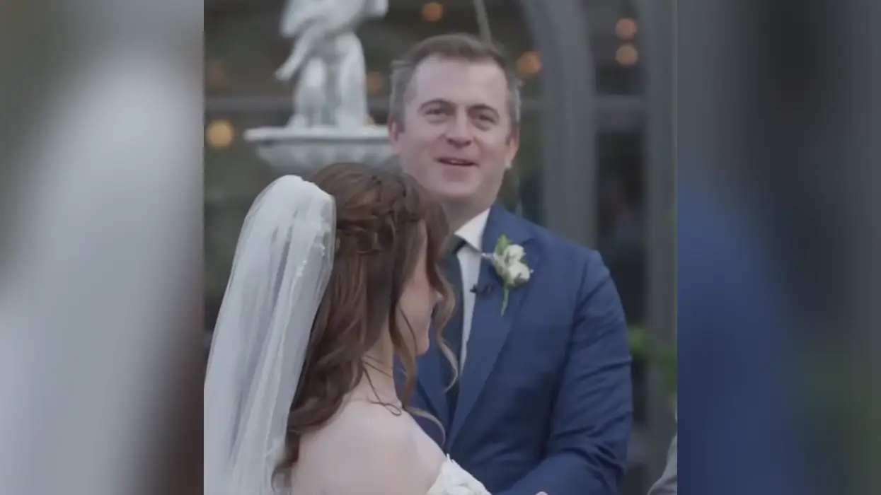 Wedding officiant gets shamed for thinking AWFL bride was taking her husband's last name, his reaction is all of us
